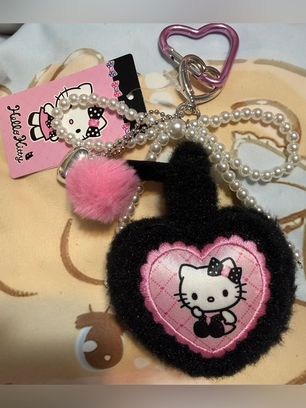 🆕 Miniso Hello Kitty Black & Pink Plush Heart Perfume shaped Keychain